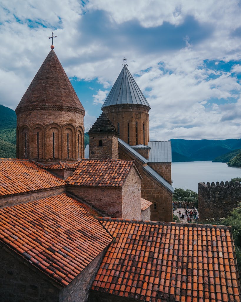 Capture of Ananuri Fortress in Georgia with scenic river views, showing its unique orthodox architecture.