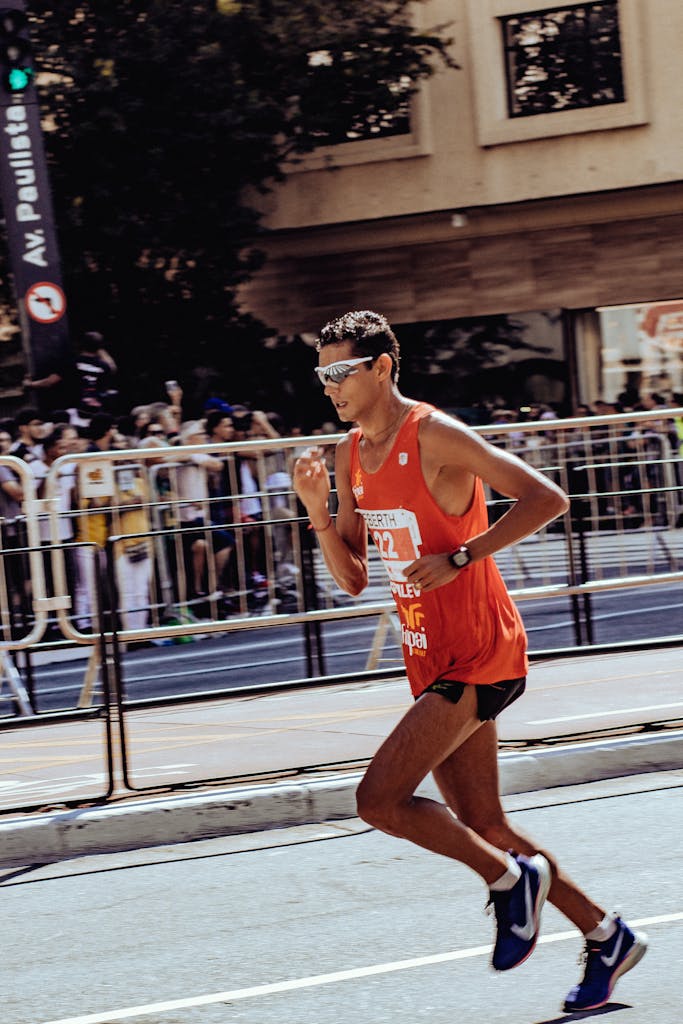 Captured moment of a marathon runner in motion during a street race.