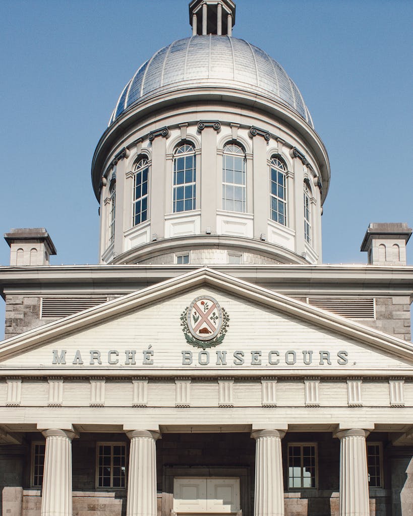 The neoclassical facade of Bonsecours Market in Montreal showcasing its iconic dome.